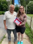 Eric Van Benschoten, treasurer of the Margaretville Rotary club, awards the winning prize in the clubs’ recent fundraising raffle to Niamh Walsh.